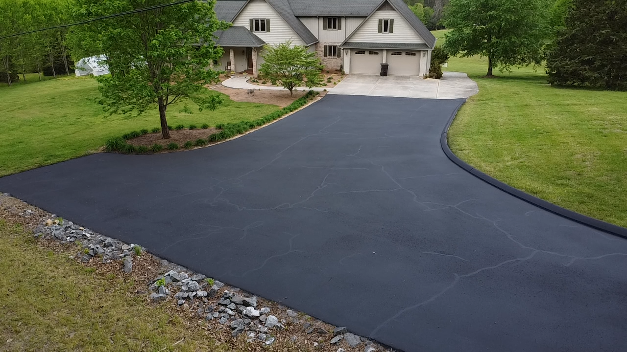 newly paved asphalt driveway