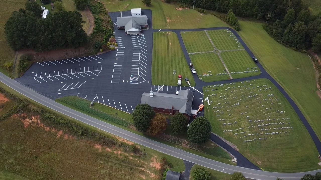 newly paved funeral home and cemetery drives and parking lot