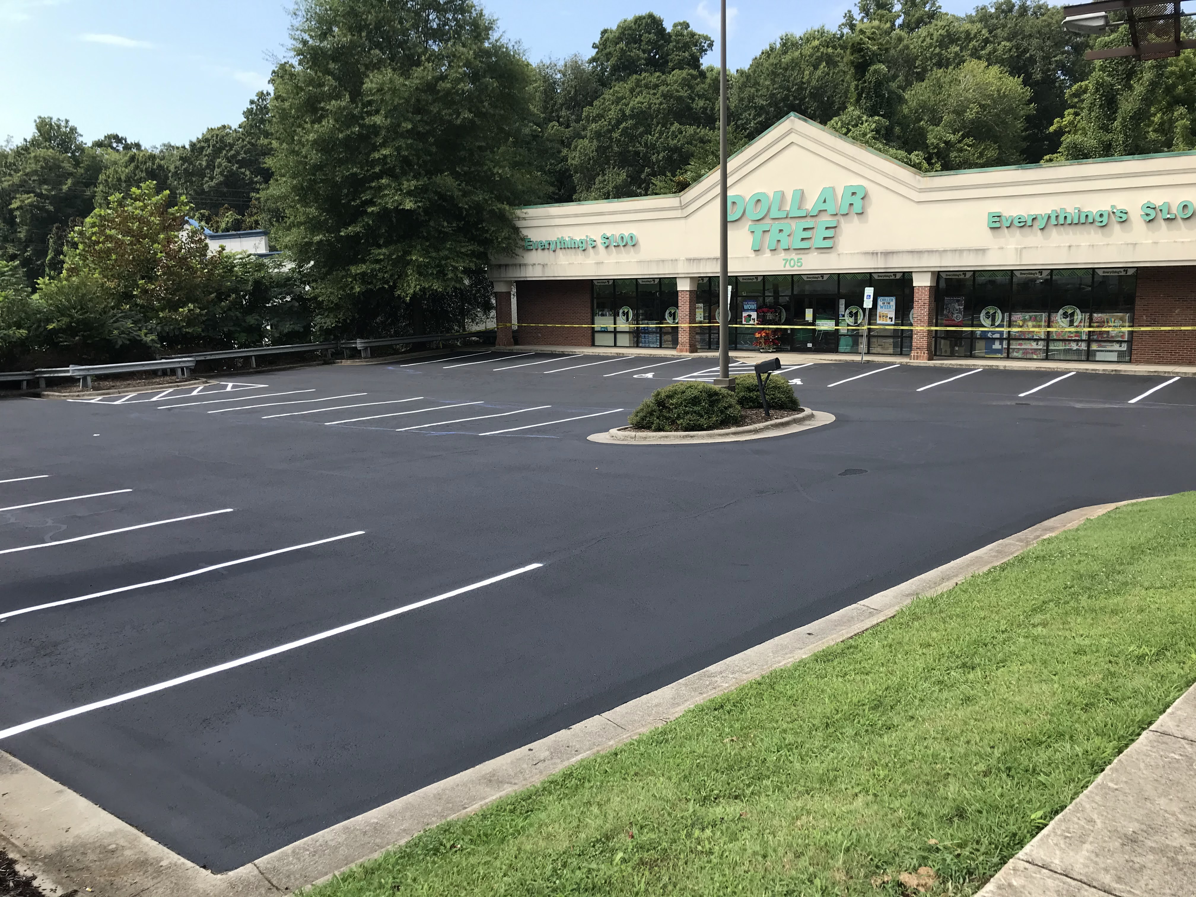 newly paved Dollar Tree parking lot
